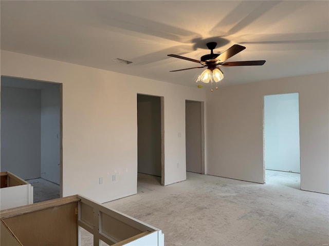 unfurnished room with ceiling fan