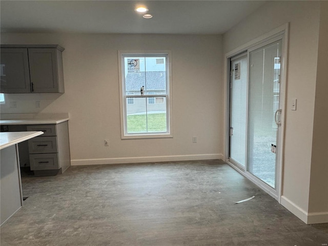 unfurnished dining area with light hardwood / wood-style floors