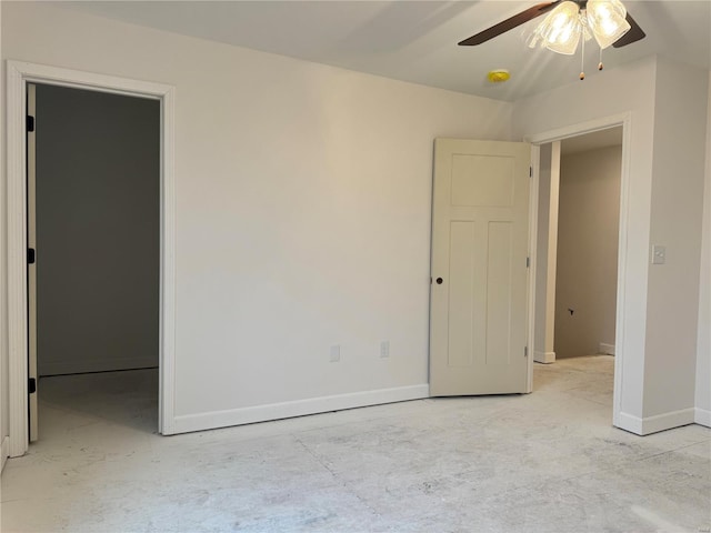 unfurnished room with ceiling fan