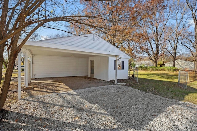 garage featuring a yard