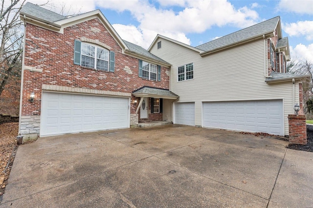 view of front of home with a garage