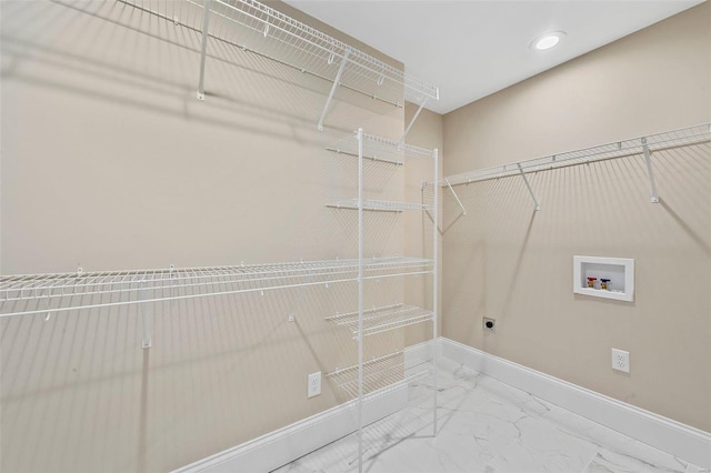 laundry room with electric dryer hookup and hookup for a washing machine