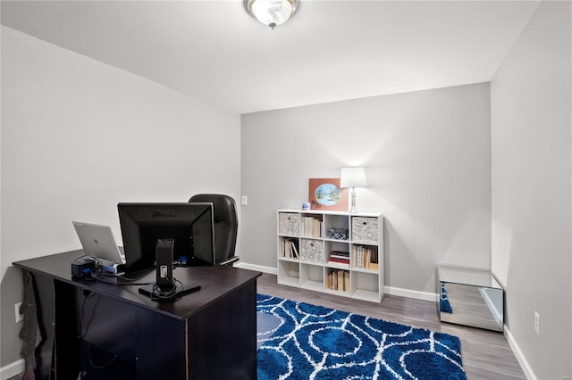 office space featuring hardwood / wood-style floors