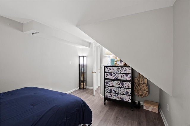 bedroom featuring hardwood / wood-style floors