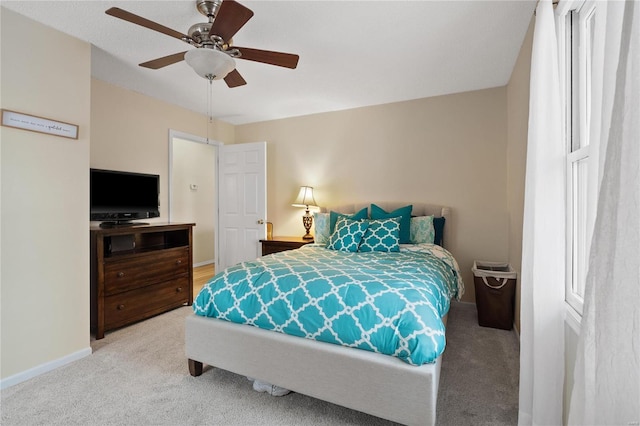 bedroom featuring ceiling fan and carpet floors