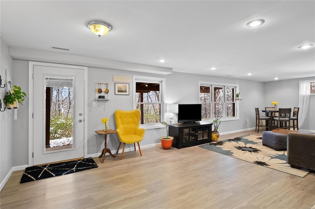 living room featuring light hardwood / wood-style floors