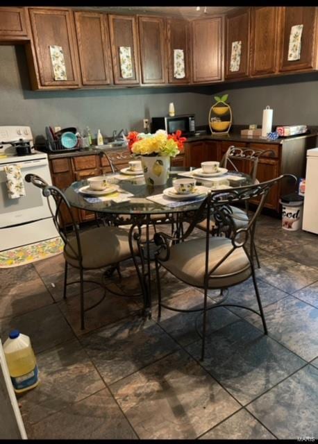 dining space with sink