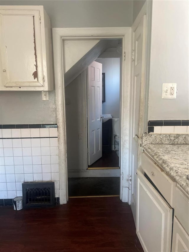 interior space with dark wood-type flooring