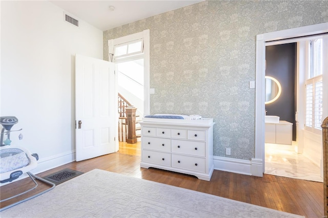 bedroom featuring wood-type flooring