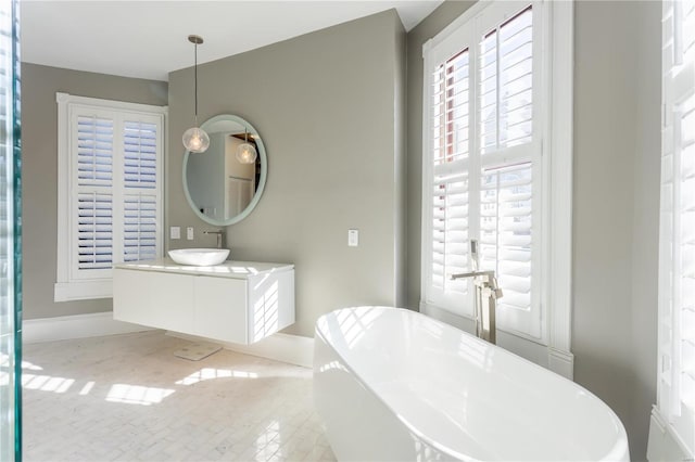 bathroom featuring a bathtub and vanity