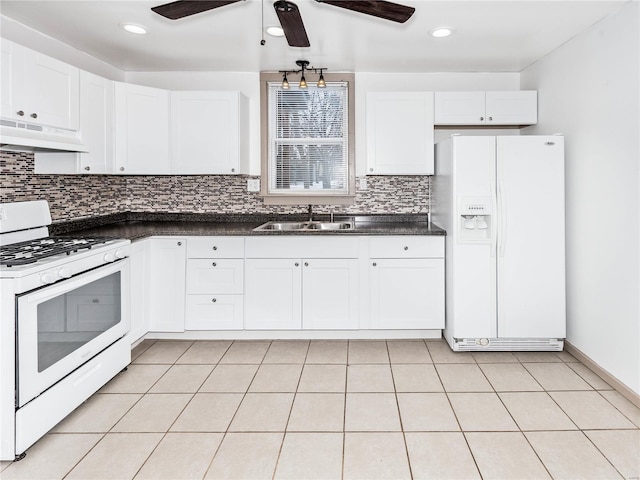 kitchen with custom exhaust hood, white appliances, sink, decorative backsplash, and white cabinetry