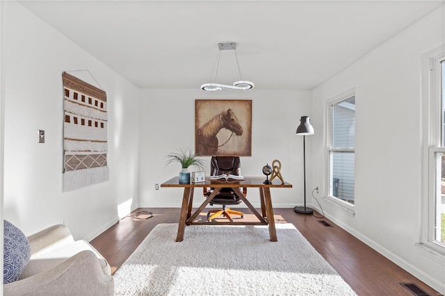 office area with dark wood-type flooring