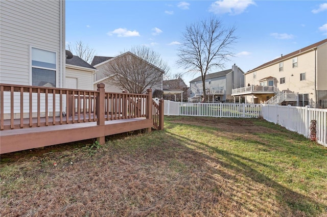 view of yard featuring a wooden deck