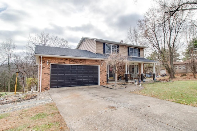 view of front property featuring a garage, covered porch, and a front lawn