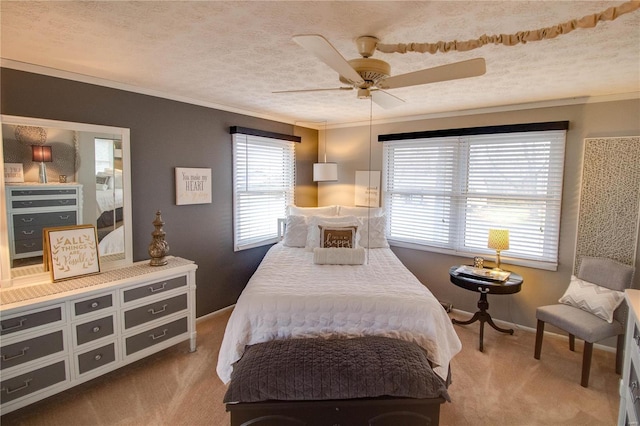 bedroom featuring carpet flooring, ceiling fan, a textured ceiling, and ornamental molding