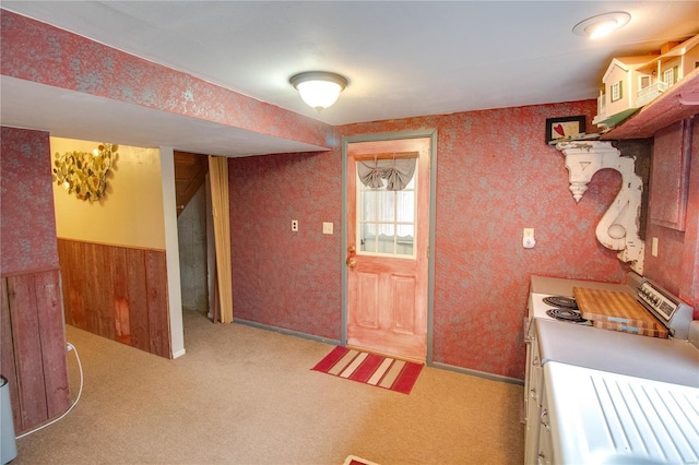 kitchen with light carpet