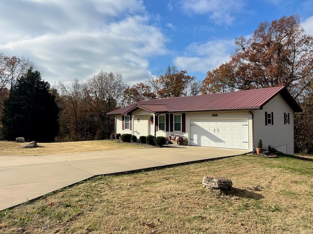 single story home with a front yard and a garage