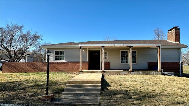 single story home featuring a front yard