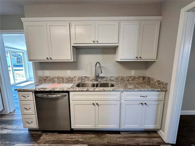 kitchen featuring dark hardwood / wood-style floors, white cabinetry, dishwasher, sink, and light stone counters