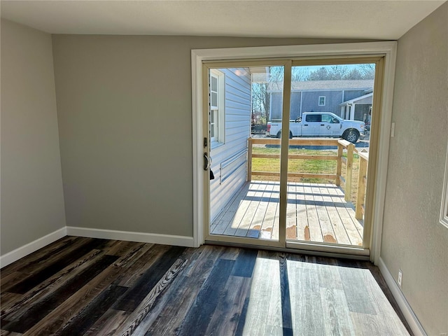 entryway with dark hardwood / wood-style floors