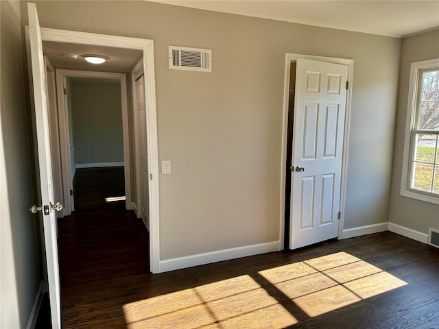 interior space with dark wood-type flooring