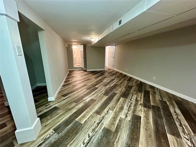 unfurnished room featuring dark hardwood / wood-style floors