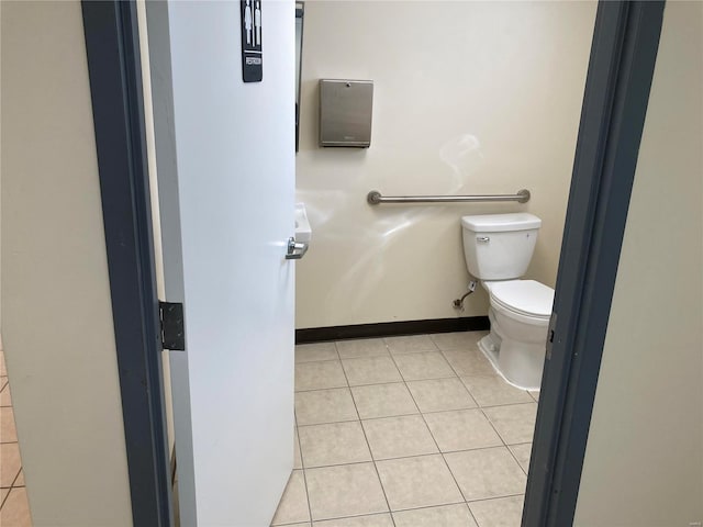 bathroom featuring tile patterned floors and toilet