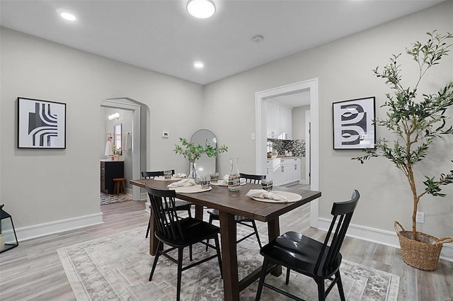 dining room featuring light wood-type flooring