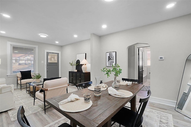 dining area with light hardwood / wood-style flooring