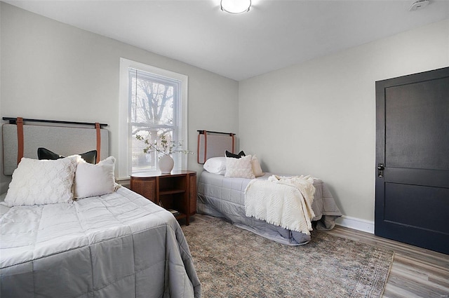 bedroom featuring hardwood / wood-style floors