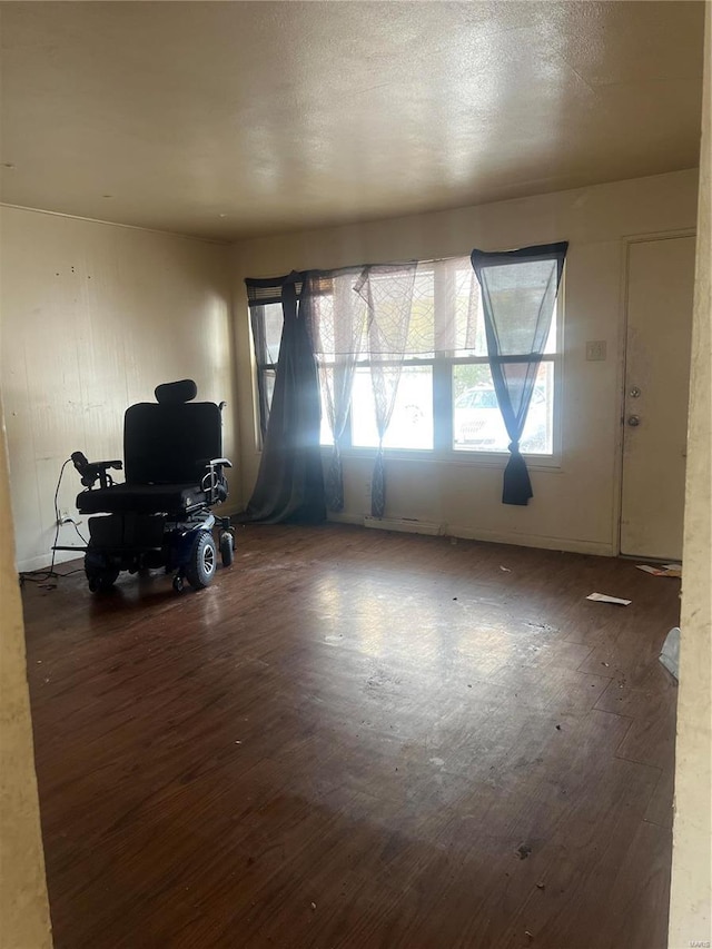 unfurnished living room with hardwood / wood-style floors