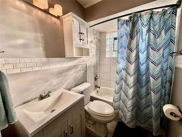 bathroom with shower / tub combo with curtain, toilet, tasteful backsplash, tile walls, and vanity