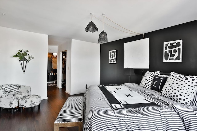 bedroom featuring dark hardwood / wood-style flooring