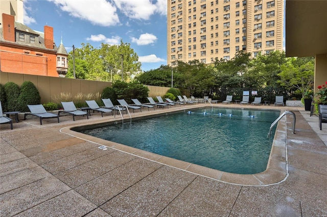 view of pool featuring a patio area