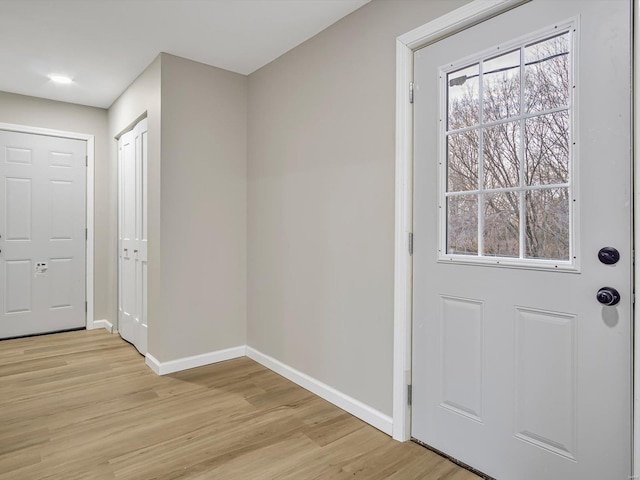 doorway to outside featuring light hardwood / wood-style floors