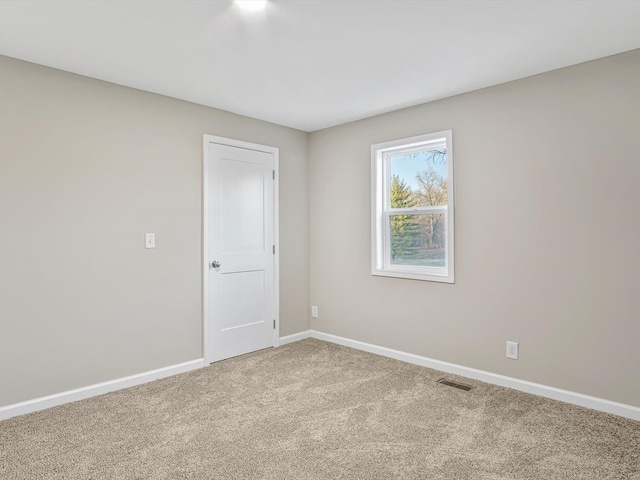 view of carpeted spare room