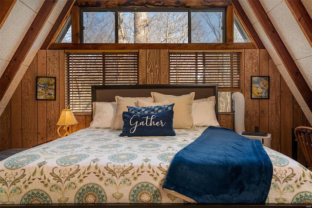 bedroom with vaulted ceiling with beams and wooden walls