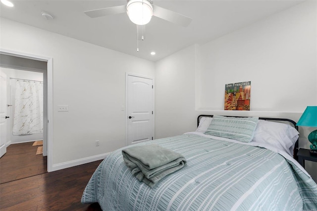 bedroom with ceiling fan and dark hardwood / wood-style floors