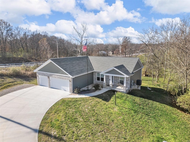 ranch-style house with a front yard and a garage