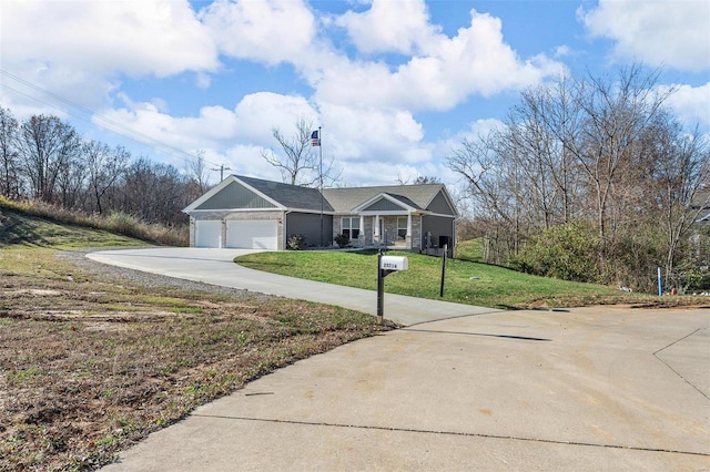 view of front facade featuring a garage and a front lawn