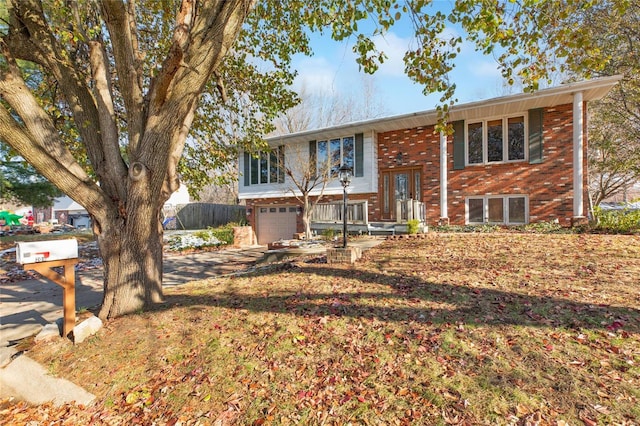 split foyer home featuring a garage