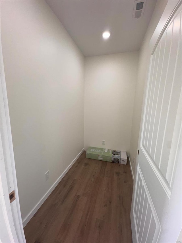 interior space with recessed lighting, visible vents, baseboards, and wood finished floors