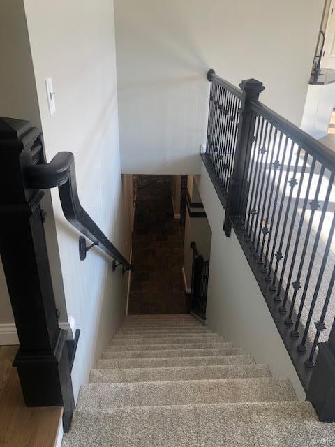 stairway with carpet flooring