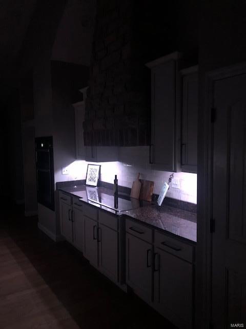 kitchen featuring dark hardwood / wood-style floors