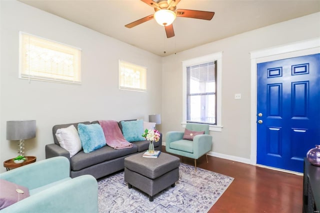 living room featuring a wealth of natural light, hardwood / wood-style floors, and ceiling fan