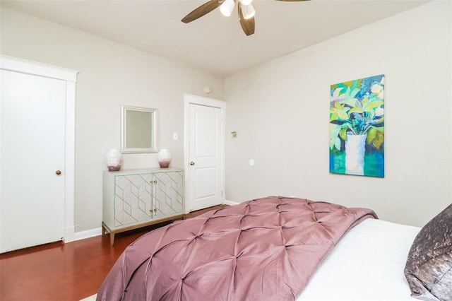 bedroom featuring hardwood / wood-style flooring and ceiling fan