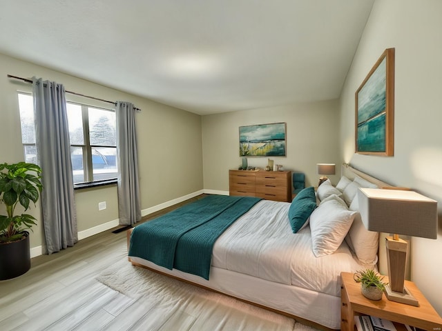 bedroom featuring light wood-type flooring