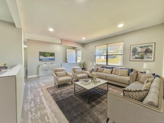 living room featuring concrete floors