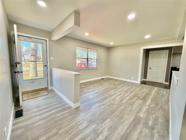 foyer with light wood-type flooring