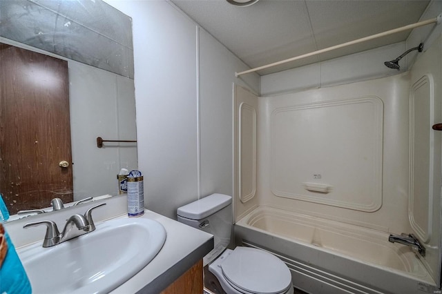 full bathroom with toilet, vanity, and  shower combination